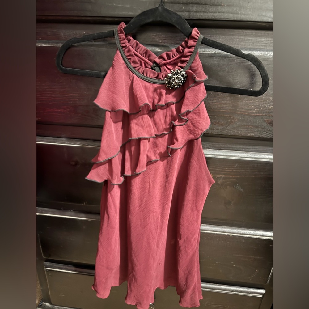 Ruffled Sleeveless Top with Brooch